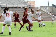 UT sophomore Kirsten Birkhold (#2, Forward and Midfielder) waits for the header.  The University of Texas women's soccer team won 2-1 against the Iowa State Cyclones Sunday afternoon, October 5, 2008.

Filename: SRM_20081005_12310850.jpg
Aperture: f/5.6
Shutter Speed: 1/1600
Body: Canon EOS 20D
Lens: Canon EF 80-200mm f/2.8 L