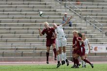 UT freshman Lucy Keith (#6, Midfielder) fights for the header as UT senior Jill Gilbeau (#4, Defender and Midfielder) watches.  The University of Texas women's soccer team won 2-1 against the Iowa State Cyclones Sunday afternoon, October 5, 2008.

Filename: SRM_20081005_12313698.jpg
Aperture: f/5.6
Shutter Speed: 1/2000
Body: Canon EOS-1D Mark II
Lens: Canon EF 300mm f/2.8 L IS