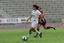 UT senior Stephanie Logterman (#10, Defender) runs with the ball.  The University of Texas women's soccer team won 2-1 against the Iowa State Cyclones Sunday afternoon, October 5, 2008.

Filename: SRM_20081005_12322819.jpg
Aperture: f/5.6
Shutter Speed: 1/2000
Body: Canon EOS-1D Mark II
Lens: Canon EF 300mm f/2.8 L IS
