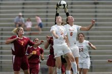 UT junior Emily Anderson (#21, Forward) and UT freshman Lucy Keith (#6, Midfielder) fight for the header with the keeper, as UT junior Stephanie Gibson (#22, Defense and Forward) watches.  The University of Texas women's soccer team won 2-1 against the Iowa State Cyclones Sunday afternoon, October 5, 2008.

Filename: SRM_20081005_12420622.jpg
Aperture: f/5.6
Shutter Speed: 1/2000
Body: Canon EOS-1D Mark II
Lens: Canon EF 300mm f/2.8 L IS