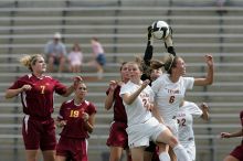 UT junior Emily Anderson (#21, Forward) and UT freshman Lucy Keith (#6, Midfielder) fight for the header with the keeper, as UT junior Stephanie Gibson (#22, Defense and Forward) watches.  The University of Texas women's soccer team won 2-1 against the Iowa State Cyclones Sunday afternoon, October 5, 2008.

Filename: SRM_20081005_12420623.jpg
Aperture: f/5.6
Shutter Speed: 1/2000
Body: Canon EOS-1D Mark II
Lens: Canon EF 300mm f/2.8 L IS