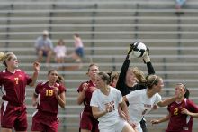 UT junior Emily Anderson (#21, Forward) and UT freshman Lucy Keith (#6, Midfielder) fight for the header with the keeper, as UT junior Stephanie Gibson (#22, Defense and Forward) watches.  The University of Texas women's soccer team won 2-1 against the Iowa State Cyclones Sunday afternoon, October 5, 2008.

Filename: SRM_20081005_12420624.jpg
Aperture: f/5.6
Shutter Speed: 1/1600
Body: Canon EOS-1D Mark II
Lens: Canon EF 300mm f/2.8 L IS