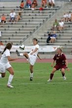 UT senior Stephanie Logterman (#10, Defender) passes the ball in the second half.  The University of Texas women's soccer team won 2-1 against the Iowa State Cyclones Sunday afternoon, October 5, 2008.

Filename: SRM_20081005_13050458.jpg
Aperture: f/5.6
Shutter Speed: 1/1250
Body: Canon EOS-1D Mark II
Lens: Canon EF 300mm f/2.8 L IS