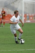 UT senior Kasey Moore (#14, Defender) in the second half.  The University of Texas women's soccer team won 2-1 against the Iowa State Cyclones Sunday afternoon, October 5, 2008.

Filename: SRM_20081005_13092434.jpg
Aperture: f/5.6
Shutter Speed: 1/2000
Body: Canon EOS-1D Mark II
Lens: Canon EF 300mm f/2.8 L IS