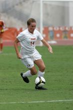 UT senior Kasey Moore (#14, Defender) in the second half.  The University of Texas women's soccer team won 2-1 against the Iowa State Cyclones Sunday afternoon, October 5, 2008.

Filename: SRM_20081005_13092435.jpg
Aperture: f/5.6
Shutter Speed: 1/2000
Body: Canon EOS-1D Mark II
Lens: Canon EF 300mm f/2.8 L IS