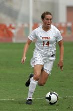 UT senior Kasey Moore (#14, Defender) in the second half.  The University of Texas women's soccer team won 2-1 against the Iowa State Cyclones Sunday afternoon, October 5, 2008.

Filename: SRM_20081005_13092842.jpg
Aperture: f/5.6
Shutter Speed: 1/2500
Body: Canon EOS-1D Mark II
Lens: Canon EF 300mm f/2.8 L IS
