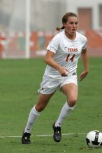 UT senior Kasey Moore (#14, Defender) in the second half.  The University of Texas women's soccer team won 2-1 against the Iowa State Cyclones Sunday afternoon, October 5, 2008.

Filename: SRM_20081005_13092843.jpg
Aperture: f/5.6
Shutter Speed: 1/2000
Body: Canon EOS-1D Mark II
Lens: Canon EF 300mm f/2.8 L IS