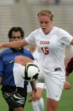 UT freshman Kylie Doniak (#15, Midfielder) in the second half.  The University of Texas women's soccer team won 2-1 against the Iowa State Cyclones Sunday afternoon, October 5, 2008.

Filename: SRM_20081005_13164036.jpg
Aperture: f/5.6
Shutter Speed: 1/1600
Body: Canon EOS-1D Mark II
Lens: Canon EF 300mm f/2.8 L IS