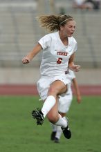 UT freshman Lucy Keith (#6, Midfielder) in mid-jump in the second half.  The University of Texas women's soccer team won 2-1 against the Iowa State Cyclones Sunday afternoon, October 5, 2008.

Filename: SRM_20081005_13173041.jpg
Aperture: f/5.6
Shutter Speed: 1/1600
Body: Canon EOS-1D Mark II
Lens: Canon EF 300mm f/2.8 L IS
