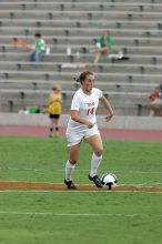 UT senior Kasey Moore (#14, Defender) takes the ball upfield in the second half.  The University of Texas women's soccer team won 2-1 against the Iowa State Cyclones Sunday afternoon, October 5, 2008.

Filename: SRM_20081005_13174857.jpg
Aperture: f/5.6
Shutter Speed: 1/1250
Body: Canon EOS-1D Mark II
Lens: Canon EF 300mm f/2.8 L IS