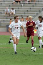 UT senior Kasey Moore (#14, Defender) takes the ball upfield in the second half.  The University of Texas women's soccer team won 2-1 against the Iowa State Cyclones Sunday afternoon, October 5, 2008.

Filename: SRM_20081005_13175265.jpg
Aperture: f/5.6
Shutter Speed: 1/1250
Body: Canon EOS-1D Mark II
Lens: Canon EF 300mm f/2.8 L IS