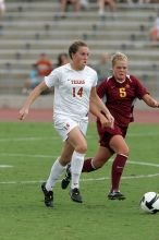 UT senior Kasey Moore (#14, Defender) takes the ball upfield in the second half.  The University of Texas women's soccer team won 2-1 against the Iowa State Cyclones Sunday afternoon, October 5, 2008.

Filename: SRM_20081005_13175471.jpg
Aperture: f/5.6
Shutter Speed: 1/1250
Body: Canon EOS-1D Mark II
Lens: Canon EF 300mm f/2.8 L IS