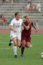 UT senior Kasey Moore (#14, Defender) takes the ball upfield in the second half.  The University of Texas women's soccer team won 2-1 against the Iowa State Cyclones Sunday afternoon, October 5, 2008.

Filename: SRM_20081005_13175472.jpg
Aperture: f/5.6
Shutter Speed: 1/1250
Body: Canon EOS-1D Mark II
Lens: Canon EF 300mm f/2.8 L IS