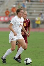 UT senior Kasey Moore (#14, Defender) takes the ball upfield in the second half.  The University of Texas women's soccer team won 2-1 against the Iowa State Cyclones Sunday afternoon, October 5, 2008.

Filename: SRM_20081005_13175676.jpg
Aperture: f/5.6
Shutter Speed: 1/1000
Body: Canon EOS-1D Mark II
Lens: Canon EF 300mm f/2.8 L IS