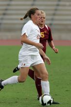 UT senior Kasey Moore (#14, Defender) takes the ball upfield in the second half.  The University of Texas women's soccer team won 2-1 against the Iowa State Cyclones Sunday afternoon, October 5, 2008.

Filename: SRM_20081005_13175680.jpg
Aperture: f/5.6
Shutter Speed: 1/1600
Body: Canon EOS-1D Mark II
Lens: Canon EF 300mm f/2.8 L IS