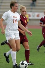 UT senior Kasey Moore (#14, Defender) takes the ball upfield in the second half.  The University of Texas women's soccer team won 2-1 against the Iowa State Cyclones Sunday afternoon, October 5, 2008.

Filename: SRM_20081005_13175882.jpg
Aperture: f/5.6
Shutter Speed: 1/1250
Body: Canon EOS-1D Mark II
Lens: Canon EF 300mm f/2.8 L IS