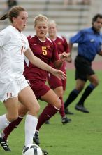 UT senior Kasey Moore (#14, Defender) takes the ball upfield in the second half.  The University of Texas women's soccer team won 2-1 against the Iowa State Cyclones Sunday afternoon, October 5, 2008.

Filename: SRM_20081005_13175883.jpg
Aperture: f/5.6
Shutter Speed: 1/1000
Body: Canon EOS-1D Mark II
Lens: Canon EF 300mm f/2.8 L IS