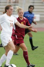 UT senior Kasey Moore (#14, Defender) takes the ball upfield in the second half.  The University of Texas women's soccer team won 2-1 against the Iowa State Cyclones Sunday afternoon, October 5, 2008.

Filename: SRM_20081005_13175884.jpg
Aperture: f/5.6
Shutter Speed: 1/800
Body: Canon EOS-1D Mark II
Lens: Canon EF 300mm f/2.8 L IS