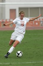UT freshman Kylie Doniak (#15, Midfielder) crosses the ball in the second half.  The University of Texas women's soccer team won 2-1 against the Iowa State Cyclones Sunday afternoon, October 5, 2008.

Filename: SRM_20081005_13181400.jpg
Aperture: f/5.6
Shutter Speed: 1/1600
Body: Canon EOS-1D Mark II
Lens: Canon EF 300mm f/2.8 L IS
