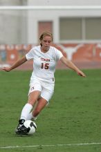 UT freshman Kylie Doniak (#15, Midfielder) crosses the ball in the second half.  The University of Texas women's soccer team won 2-1 against the Iowa State Cyclones Sunday afternoon, October 5, 2008.

Filename: SRM_20081005_13181401.jpg
Aperture: f/5.6
Shutter Speed: 1/1600
Body: Canon EOS-1D Mark II
Lens: Canon EF 300mm f/2.8 L IS