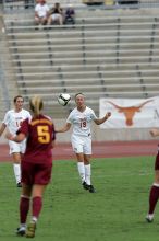 UT sophomore Erica Campanelli (#19, Defender) heads the ball as UT senior Kasey Moore (#14, Defender) watches in the second half. The University of Texas women's soccer team won 2-1 against the Iowa State Cyclones Sunday afternoon, October 5, 2008. UT sophomore Erica Campanelli (#19, Defender) heads the ball as UT senior Kasey Moore (#14, Defender) watches in the second half. The University of Texas women's soccer team won 2-1 against the Iowa State Cyclones Sunday afternoon, October 5, 2008.