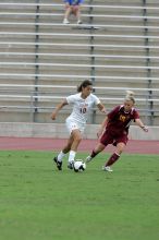 UT senior Stephanie Logterman (#10, Defender) in the second half.  The University of Texas women's soccer team won 2-1 against the Iowa State Cyclones Sunday afternoon, October 5, 2008.

Filename: SRM_20081005_13253694.jpg
Aperture: f/5.6
Shutter Speed: 1/1250
Body: Canon EOS-1D Mark II
Lens: Canon EF 300mm f/2.8 L IS