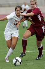 UT sophomore Alisha Ortiz (#12, Forward) in the second half.  The University of Texas women's soccer team won 2-1 against the Iowa State Cyclones Sunday afternoon, October 5, 2008.

Filename: SRM_20081005_13262636.jpg
Aperture: f/5.6
Shutter Speed: 1/1250
Body: Canon EOS-1D Mark II
Lens: Canon EF 300mm f/2.8 L IS