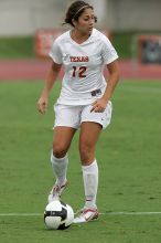 UT sophomore Alisha Ortiz (#12, Forward) in the second half.  The University of Texas women's soccer team won 2-1 against the Iowa State Cyclones Sunday afternoon, October 5, 2008.

Filename: SRM_20081005_13280672.jpg
Aperture: f/5.6
Shutter Speed: 1/1600
Body: Canon EOS-1D Mark II
Lens: Canon EF 300mm f/2.8 L IS
