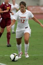UT sophomore Alisha Ortiz (#12, Forward) in the second half.  The University of Texas women's soccer team won 2-1 against the Iowa State Cyclones Sunday afternoon, October 5, 2008.

Filename: SRM_20081005_13280675.jpg
Aperture: f/5.6
Shutter Speed: 1/1600
Body: Canon EOS-1D Mark II
Lens: Canon EF 300mm f/2.8 L IS