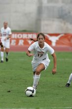 UT sophomore Alisha Ortiz (#12, Forward) in the second half.  The University of Texas women's soccer team won 2-1 against the Iowa State Cyclones Sunday afternoon, October 5, 2008.

Filename: SRM_20081005_13330052.jpg
Aperture: f/5.6
Shutter Speed: 1/1600
Body: Canon EOS-1D Mark II
Lens: Canon EF 300mm f/2.8 L IS