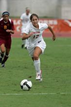 UT sophomore Alisha Ortiz (#12, Forward) in the second half.  The University of Texas women's soccer team won 2-1 against the Iowa State Cyclones Sunday afternoon, October 5, 2008.

Filename: SRM_20081005_13330053.jpg
Aperture: f/5.6
Shutter Speed: 1/1600
Body: Canon EOS-1D Mark II
Lens: Canon EF 300mm f/2.8 L IS