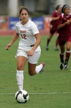 UT sophomore Alisha Ortiz (#12, Forward) in the second half.  The University of Texas women's soccer team won 2-1 against the Iowa State Cyclones Sunday afternoon, October 5, 2008.

Filename: SRM_20081005_13330257.jpg
Aperture: f/5.6
Shutter Speed: 1/1600
Body: Canon EOS-1D Mark II
Lens: Canon EF 300mm f/2.8 L IS