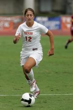 UT sophomore Alisha Ortiz (#12, Forward) in the second half.  The University of Texas women's soccer team won 2-1 against the Iowa State Cyclones Sunday afternoon, October 5, 2008.

Filename: SRM_20081005_13330258.jpg
Aperture: f/5.6
Shutter Speed: 1/1600
Body: Canon EOS-1D Mark II
Lens: Canon EF 300mm f/2.8 L IS