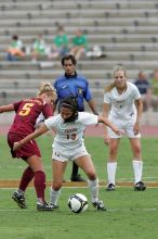 UT freshman Amanda Lisberger (#13, Midfielder) steals the ball as UT freshman Lucy Keith (#6, Midfielder) watches in the second half.  The University of Texas women's soccer team won 2-1 against the Iowa State Cyclones Sunday afternoon, October 5, 2008.

Filename: SRM_20081005_13335668.jpg
Aperture: f/5.6
Shutter Speed: 1/1000
Body: Canon EOS-1D Mark II
Lens: Canon EF 300mm f/2.8 L IS