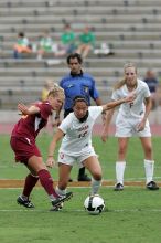 UT freshman Amanda Lisberger (#13, Midfielder) steals the ball as UT freshman Lucy Keith (#6, Midfielder) watches in the second half.  The University of Texas women's soccer team won 2-1 against the Iowa State Cyclones Sunday afternoon, October 5, 2008.

Filename: SRM_20081005_13335669.jpg
Aperture: f/5.6
Shutter Speed: 1/1250
Body: Canon EOS-1D Mark II
Lens: Canon EF 300mm f/2.8 L IS