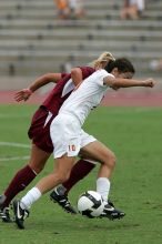 UT senior Stephanie Logterman (#10, Defender) in the second half.  The University of Texas women's soccer team won 2-1 against the Iowa State Cyclones Sunday afternoon, October 5, 2008.

Filename: SRM_20081005_13340693.jpg
Aperture: f/5.6
Shutter Speed: 1/1600
Body: Canon EOS-1D Mark II
Lens: Canon EF 300mm f/2.8 L IS