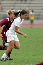 UT senior Stephanie Logterman (#10, Defender) in the second half.  The University of Texas women's soccer team won 2-1 against the Iowa State Cyclones Sunday afternoon, October 5, 2008.

Filename: SRM_20081005_13340800.jpg
Aperture: f/5.6
Shutter Speed: 1/1250
Body: Canon EOS-1D Mark II
Lens: Canon EF 300mm f/2.8 L IS