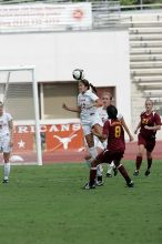 UT sophomore Alisha Ortiz (#12, Forward) gets the header in the second half.  The University of Texas women's soccer team won 2-1 against the Iowa State Cyclones Sunday afternoon, October 5, 2008.

Filename: SRM_20081005_13365207.jpg
Aperture: f/5.6
Shutter Speed: 1/2500
Body: Canon EOS-1D Mark II
Lens: Canon EF 300mm f/2.8 L IS