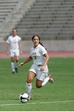 UT sophomore Alisha Ortiz (#12, Forward) in the second half.  The University of Texas women's soccer team won 2-1 against the Iowa State Cyclones Sunday afternoon, October 5, 2008.

Filename: SRM_20081005_13424665.jpg
Aperture: f/5.6
Shutter Speed: 1/2500
Body: Canon EOS-1D Mark II
Lens: Canon EF 300mm f/2.8 L IS