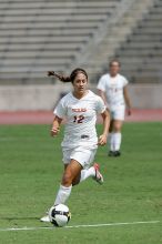 UT sophomore Alisha Ortiz (#12, Forward) in the second half.  The University of Texas women's soccer team won 2-1 against the Iowa State Cyclones Sunday afternoon, October 5, 2008.

Filename: SRM_20081005_13424666.jpg
Aperture: f/5.6
Shutter Speed: 1/2500
Body: Canon EOS-1D Mark II
Lens: Canon EF 300mm f/2.8 L IS