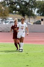 UT sophomore Alisha Ortiz (#12, Forward) in the second half.  The University of Texas women's soccer team won 2-1 against the Iowa State Cyclones Sunday afternoon, October 5, 2008.

Filename: SRM_20081005_13430829.jpg
Aperture: f/5.0
Shutter Speed: 1/2000
Body: Canon EOS 20D
Lens: Canon EF 80-200mm f/2.8 L