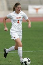 UT senior Jill Gilbeau (#4, Defender and Midfielder) in the second half.  The University of Texas women's soccer team won 2-1 against the Iowa State Cyclones Sunday afternoon, October 5, 2008.

Filename: SRM_20081005_13454209.jpg
Aperture: f/5.6
Shutter Speed: 1/2000
Body: Canon EOS-1D Mark II
Lens: Canon EF 300mm f/2.8 L IS