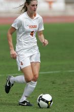 UT senior Jill Gilbeau (#4, Defender and Midfielder) in the second half.  The University of Texas women's soccer team won 2-1 against the Iowa State Cyclones Sunday afternoon, October 5, 2008.

Filename: SRM_20081005_13454412.jpg
Aperture: f/5.6
Shutter Speed: 1/2500
Body: Canon EOS-1D Mark II
Lens: Canon EF 300mm f/2.8 L IS