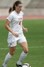 UT senior Jill Gilbeau (#4, Defender and Midfielder) in the second half.  The University of Texas women's soccer team won 2-1 against the Iowa State Cyclones Sunday afternoon, October 5, 2008.

Filename: SRM_20081005_13454415.jpg
Aperture: f/5.6
Shutter Speed: 1/2000
Body: Canon EOS-1D Mark II
Lens: Canon EF 300mm f/2.8 L IS
