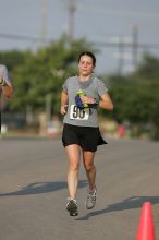 Beth Marek won first place in her age division at the Army Dillo half-marathon and 32K race.

Filename: SRM_20080921_0841362.jpg
Aperture: f/4.0
Shutter Speed: 1/2000
Body: Canon EOS-1D Mark II
Lens: Canon EF 300mm f/2.8 L IS