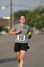 Beth Marek won first place in her age division at the Army Dillo half-marathon and 32K race.

Filename: SRM_20080921_0841386.jpg
Aperture: f/4.0
Shutter Speed: 1/2000
Body: Canon EOS-1D Mark II
Lens: Canon EF 300mm f/2.8 L IS