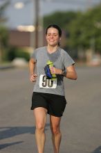 Beth Marek won first place in her age division at the Army Dillo half-marathon and 32K race.

Filename: SRM_20080921_0841388.jpg
Aperture: f/4.0
Shutter Speed: 1/2000
Body: Canon EOS-1D Mark II
Lens: Canon EF 300mm f/2.8 L IS