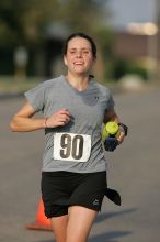 Beth Marek won first place in her age division at the Army Dillo half-marathon and 32K race.

Filename: SRM_20080921_0841405.jpg
Aperture: f/4.0
Shutter Speed: 1/2000
Body: Canon EOS-1D Mark II
Lens: Canon EF 300mm f/2.8 L IS