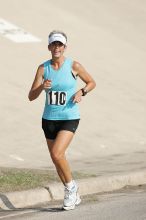 Karen Pearce placed second in her age groun at the Army Dillo half-marathon and 32K race.

Filename: SRM_20080921_0943560.jpg
Aperture: f/4.0
Shutter Speed: 1/2000
Body: Canon EOS-1D Mark II
Lens: Canon EF 300mm f/2.8 L IS