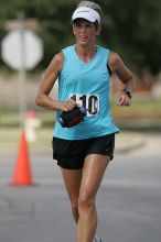 Karen Pearce placed second in her age groun at the Army Dillo half-marathon and 32K race.

Filename: SRM_20080921_1056445.jpg
Aperture: f/4.0
Shutter Speed: 1/2000
Body: Canon EOS-1D Mark II
Lens: Canon EF 300mm f/2.8 L IS